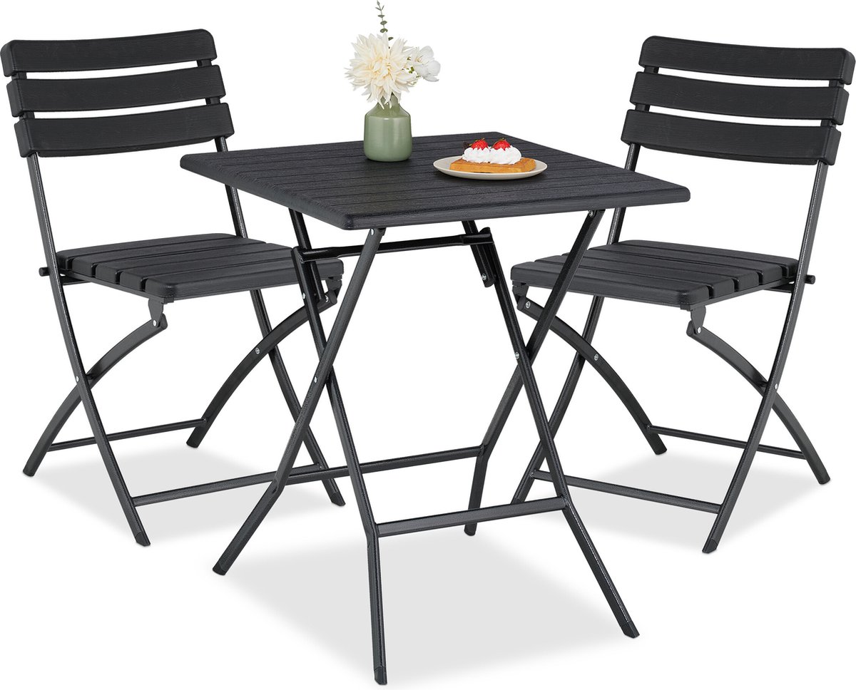 Inklapbare bistroset: 1 tafel, 2 stoelen, zwart kunststof en staal.