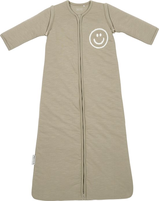 Lichtbruine MEYCO babyslaapzak met lange, afneembare mouwen en offwhite smiley applicatie.