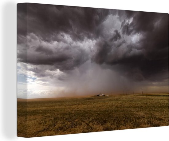 Canvas Schilderij Onweer boven klein huis in Texas - 90x60 cm - Wanddecoratie