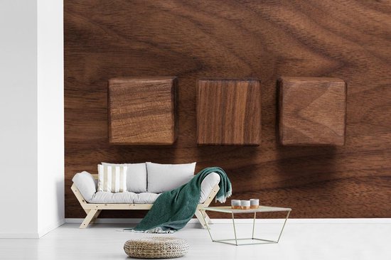 Cubes en bois sur un fond en bois fotobehang