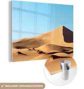MuchoWow® Glasschilderij 120x90 cm - Schilderij acrylglas - Het woestijngebied in het oosten van Marokko - Foto op glas - Schilderijen