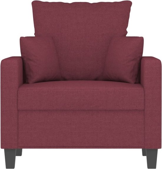 Wijnrode fauteuil met losse kussens en zwarte pootjes.
