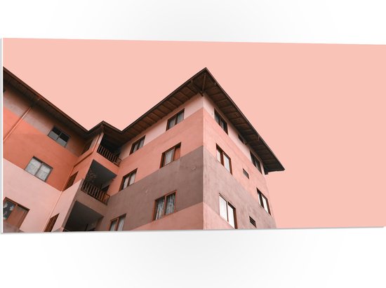 WallClassics - PVC Schuimplaat- Gekleurd Appartement met Roze lucht - 100x50 cm Foto op PVC Schuimplaat