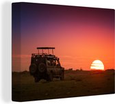 Canvas Schilderij Safari-auto kijkt uit op een zonsondergang in Kenia - 80x60 cm - Wanddecoratie