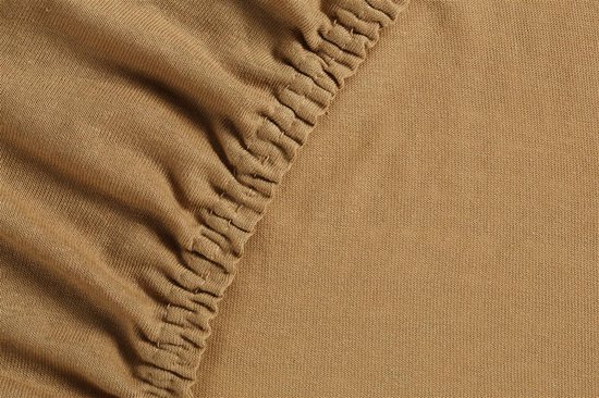 Okergeel jersey split-topper hoeslaken met elastische zoom.