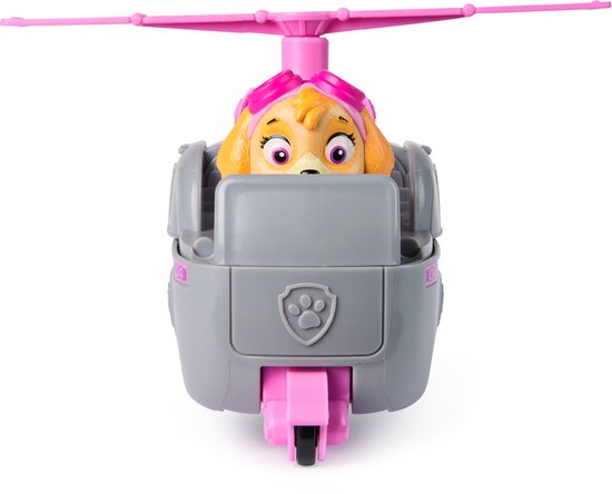 Grijze en roze Paw Patrol Skye helikopter van voren gezien met Skye figuur.