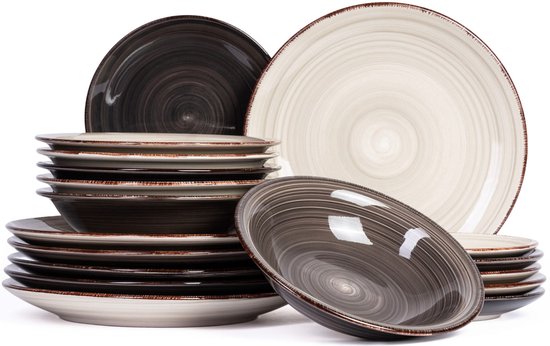 Assiettes et bols en grès gris et blanc à motif tourbillonnant, empilés.