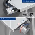 Gedetailleerde opname van een chromen thermostaatkraan met functiecontroller en 38° constante temperatuur instelling.
