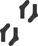 Twee paar donkergrijze Burlington sokken, elk met een subtiel logo. Eén paar is opgerold.