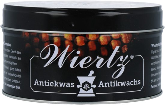Zwarte blik met "Wiertz Antiekwas", tekst en afbeelding van honingraten.