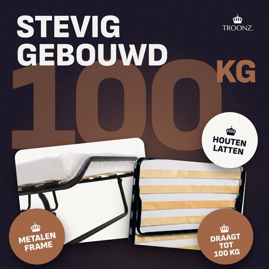 Opklapbed met houten lattenbodem en metalen frame. Draagkracht tot 100 kg.