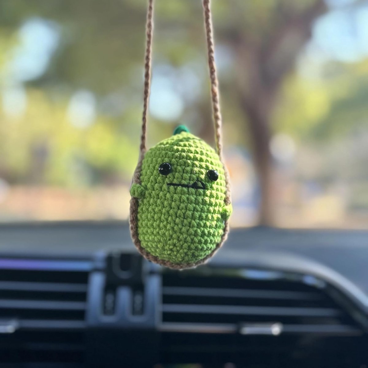 Hanger voor auto, oscillerende groene dinosaurus