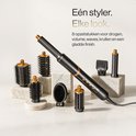 Zwarte multifunctionele föhnborstel met gouden details en 8 opzetstukken voor drogen, volume, golven, krullen en een gladde finish.