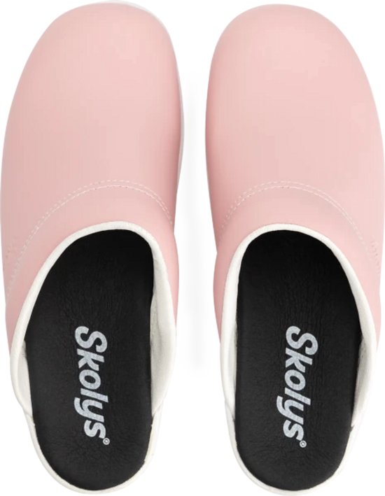 Roze Skolys klompen met witte rand en zwarte binnenzool.
