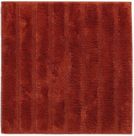 Terracotta badmat met verticale ribbels.