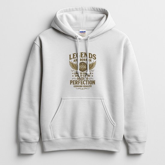 Witte hoodie met bruine tekst 'Legends are born in 1956' en vleugelmotief op de borst.