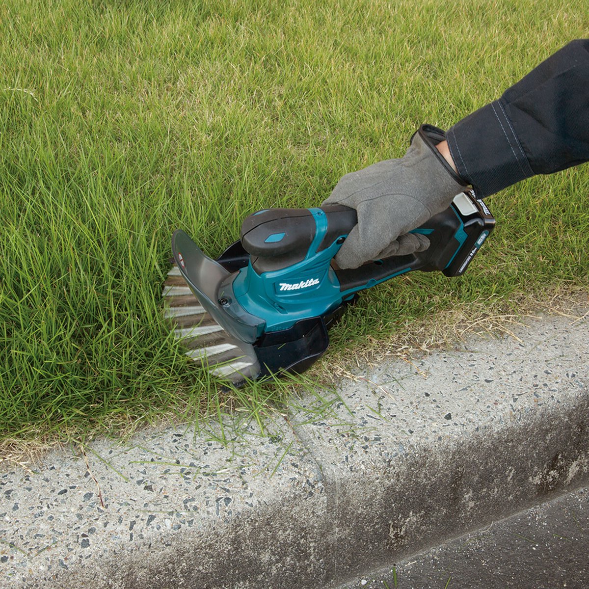 Makita UM600DZX - Cisaille à gazon et arbustes 12V - Sans batterie