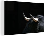 Une photo d'un taureau noir sur fond noir 60x40 cm - Tirage photo sur toile (Décoration murale salon / chambre)