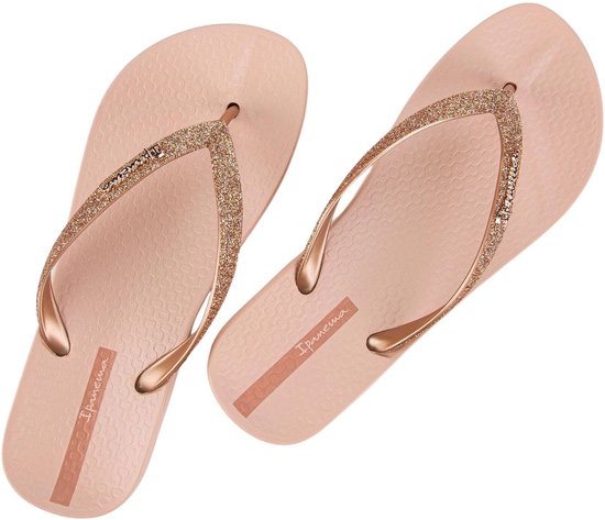 Roze Ipanema teenslippers met glitterbandjes en gouden logo's.