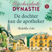 Boekcover: De Chocolade Dynastie 1 - De dochter van de apotheker. Een dorp met gele en beige gebouwen, een kerk en groen. Tekst in kalligrafie.