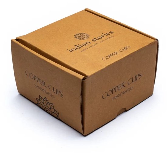 Kartonnen verpakking met 'Indian Stories Copper Cups Handcrafted' tekst en logo.