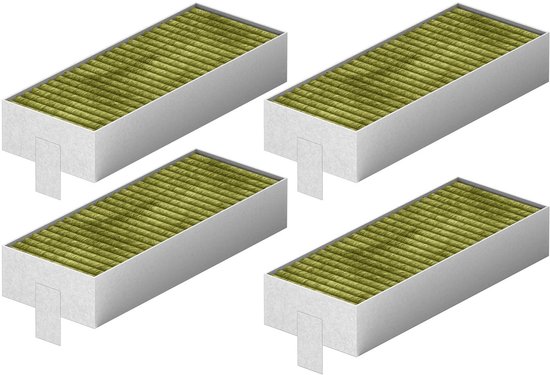 Vier witte geurfilters met groen filtermateriaal.