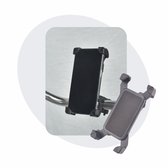 Zwarte telefoonhouder met telefoon erop gemonteerd op een fiets.