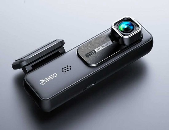Zwarte dashcam met schuine lens, close-up.