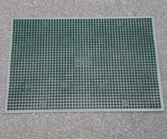 Groene mat met honingraatstructuur