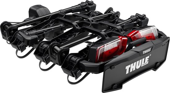 Zwarte Thule fietsendrager, compact opgevouwen, met rode achterlichten en 'Thule' logo.
