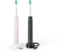 Roze en zwarte Philips Sonicare sonische tandenborstels met opladers.