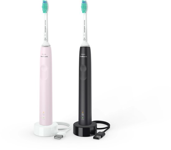 Roze en zwarte Philips Sonicare sonische tandenborstels met opladers.