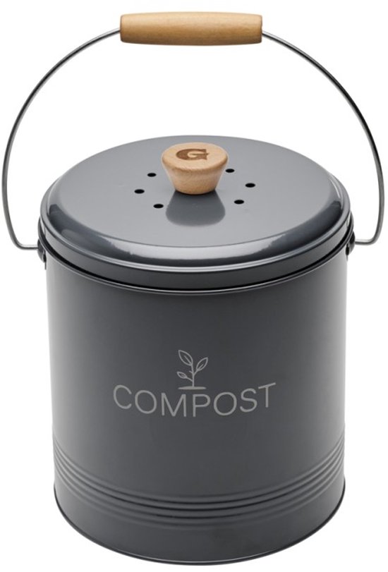 Donkere grijze compostbak van metaal met houten handvat en deksel met ventilatiegaten. Tekst: COMPOST.