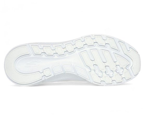 Witte buitenzool van een Skechers sneaker met een gestructureerd profiel.