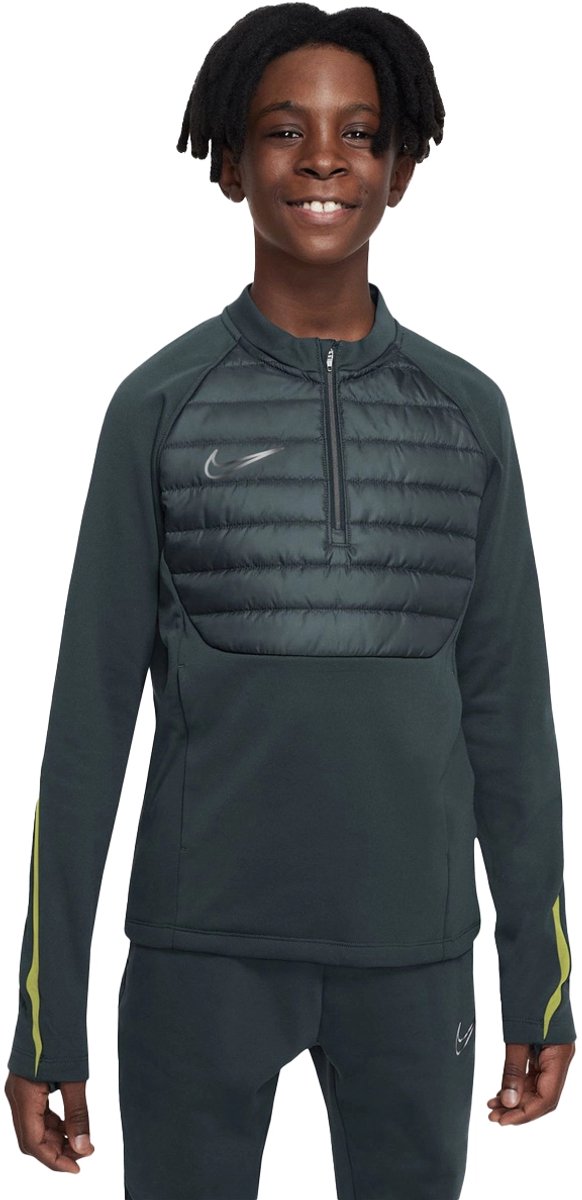 Nike nike therma-fit academy big ki in de kleur groen.