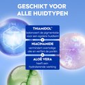 Grote blauwe, paarse en groene bubbels met tekst over THIAMIDOL, NIACINAMIDE en ALOE VERA.
