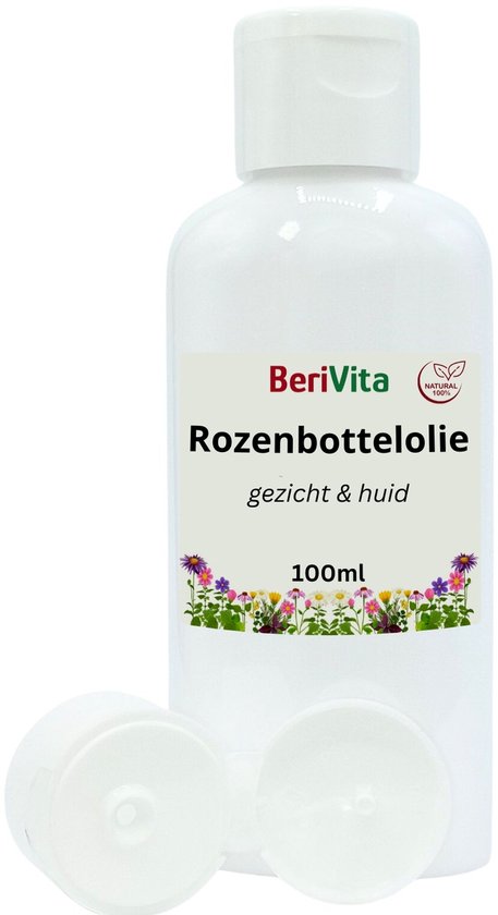 Witte fles met 'BeriVita Rozenbottelolie 100ml' etiket, de dop ligt ernaast.
