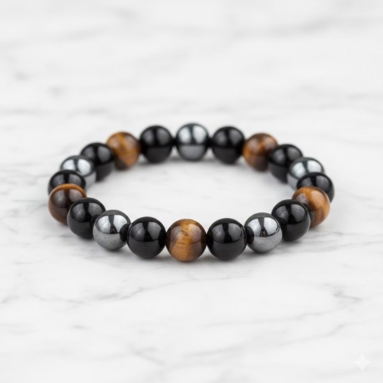 Armband met afwisselend zwarte onyx, tijgeroog en hematiet kralen.