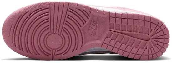 Roze rubberen zool met Nike logo en cirkelvormig profiel.