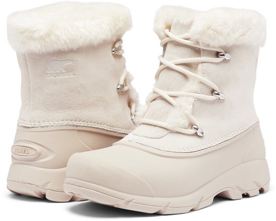 Paar crème kleurige dames snowboots van Sorel met witte bontkraag en veters.