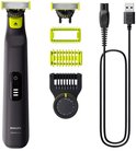Philips OneBlade Pro 360: zwarte trimmer met oplaadkabel, opzetkammen en mesjes.