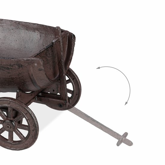 Onderdeel van een bruin metalen wagentje met vier wielen en een beweegbare dissel.