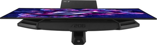 Bovenaanzicht van een ASUS ROG Strix OLED monitor met een levendige, abstracte achtergrond en het kenmerkende ROG-logo.