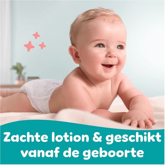 Un bébé souriant sur le ventre, avec le texte "Lotion douce et adaptée dès la naissance".