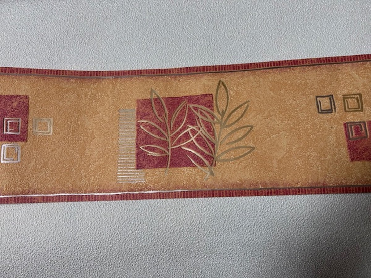 behangrand met gouden Sierlijke Bladeren