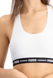 Wit Puma sportbh topje met zwarte band met Puma logo.