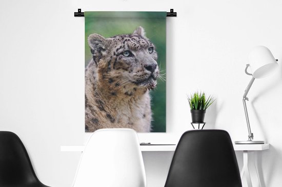 Wandkleed Sneeuwluipaard - Sneeuwluipaard die omhoog kijkt Wandkleed katoen 60x90 cm - Wandtapijt met foto