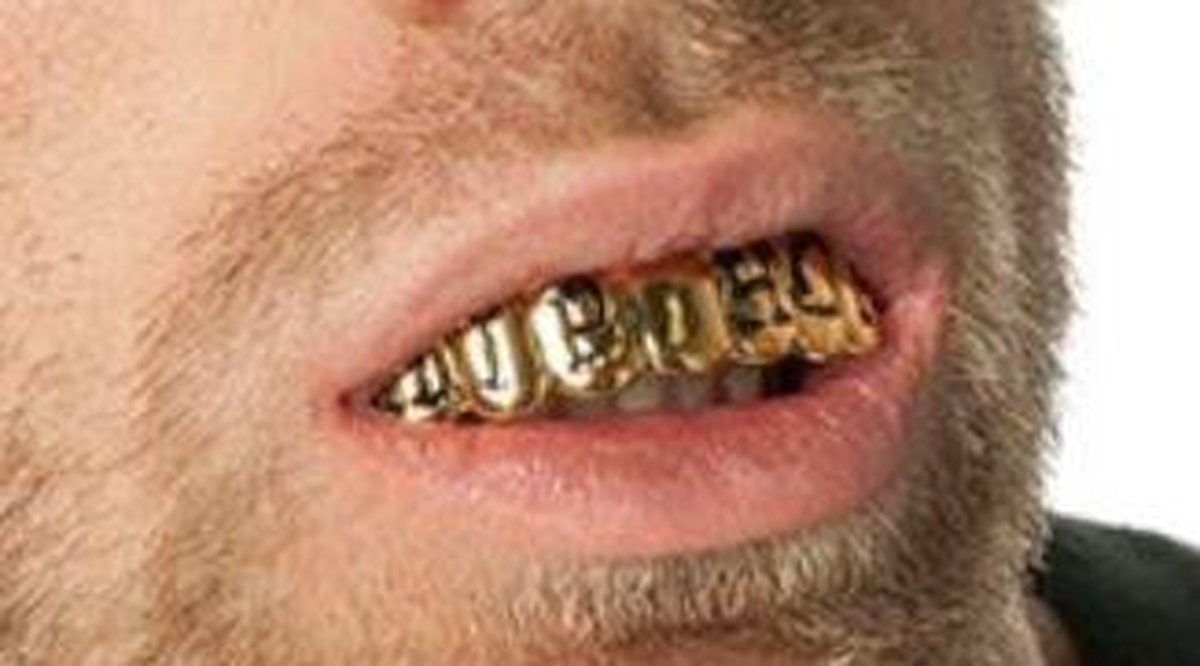 Goud Gebit Hip Hop - Gouden Tanden - Carnaval - One Size - Volwassen - Een Stuk