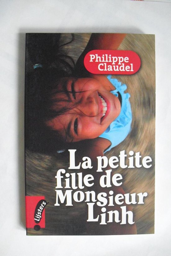 Boek "La petite fille de Monsieur Linh" met een lachend meisje op de cover.