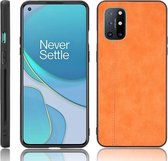 Voor OnePlus 8T schokbestendige naaiende koe-patroonhuid PC + PU + TPU-hoes (oranje)